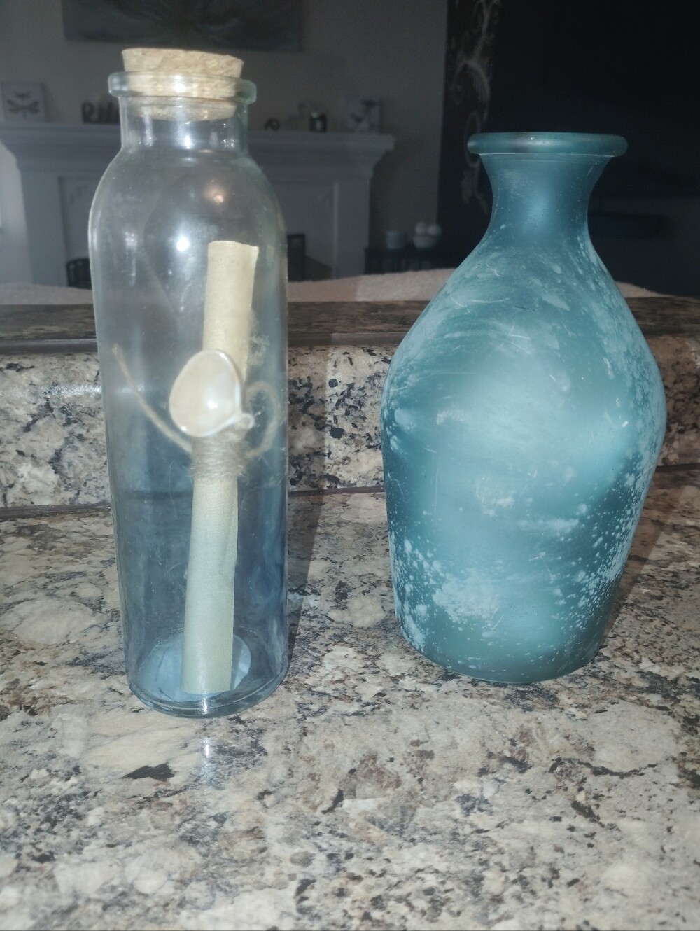 Here is a description for your home decor items:Coastal Charm Glass Bottles